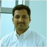 Dr. Jinesh K B